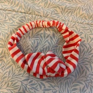 Red and white striped head and with bow